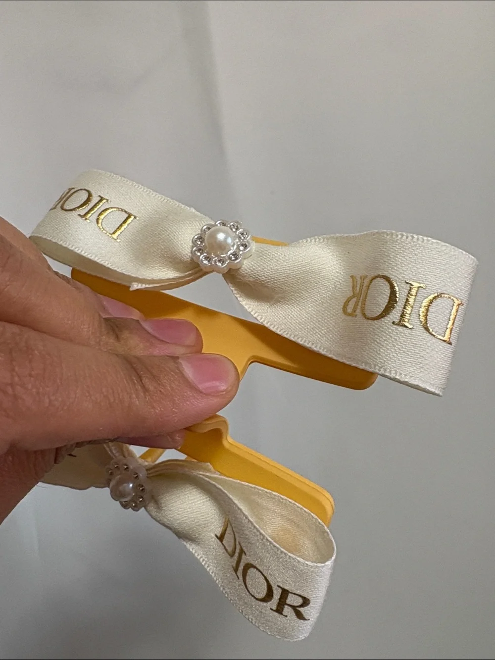 Dior Luxurious white and Gold Ribboned Hair Clip